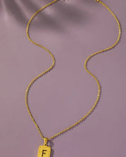 Brass diamond dust cut out initial necklace - F / one size