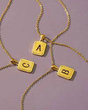 Brass diamond dust cut out initial necklace - G / one size