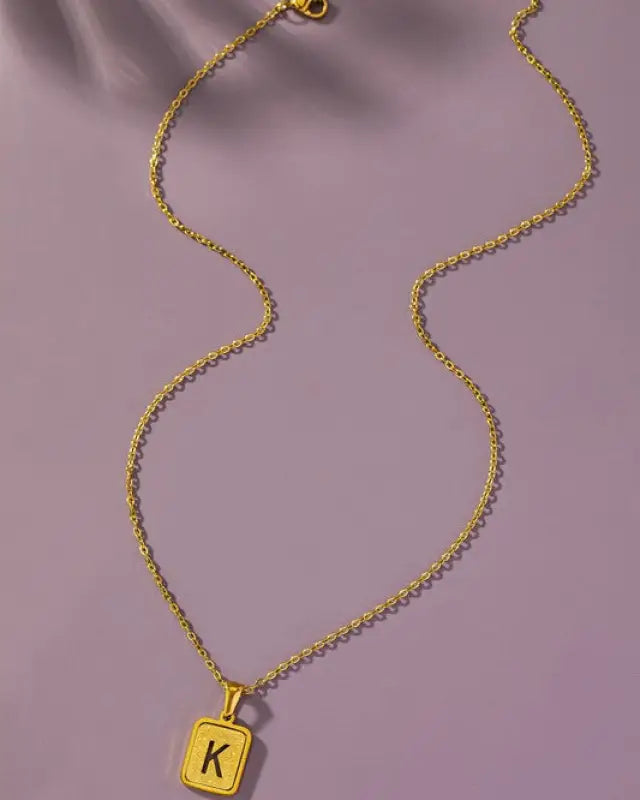 Brass diamond dust cut out initial necklace - K / one size