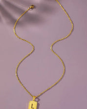 Brass diamond dust cut out initial necklace - L / one size