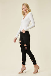 High Rise Distressed Skinny Jeans With A Raw Hem