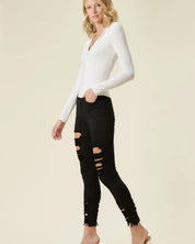 High Rise Distressed Skinny Jeans With A Raw Hem