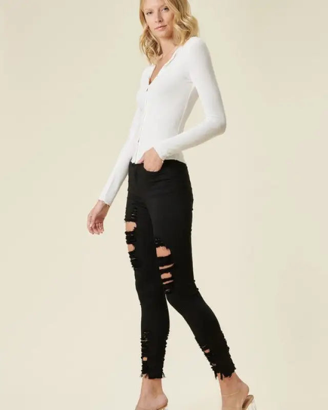 High Rise Distressed Skinny Jeans With A Raw Hem