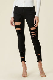 High Rise Distressed Skinny Jeans With A Raw Hem