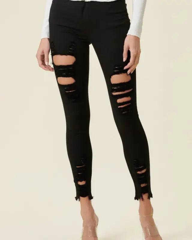 High Rise Distressed Skinny Jeans With A Raw Hem