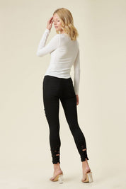 High Rise Distressed Skinny Jeans With A Raw Hem