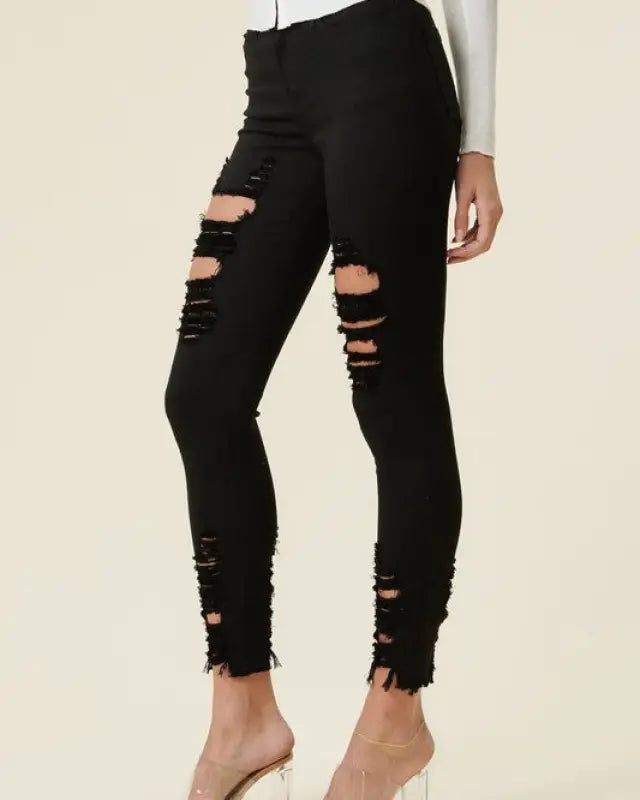 High Rise Distressed Skinny Jeans With A Raw Hem