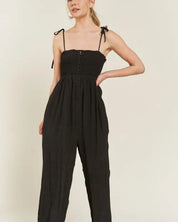 SMOCKED TIE STRAP JUMPSUIT