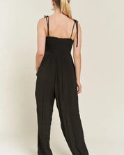 SMOCKED TIE STRAP JUMPSUIT