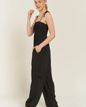 SMOCKED TIE STRAP JUMPSUIT